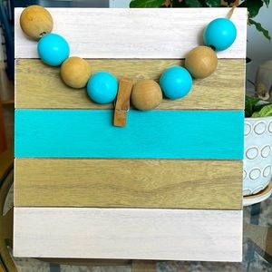 Wood and bead frame for a cute baby picture!